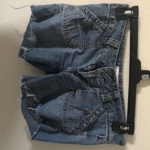 Altered distressed shorts